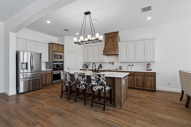 12816 Rocky Top Rd, Godley, TX 76044 - kitchen with light countertops, backsplash, visible vents, appliances with stainless steel finishes, and a notable chandelier