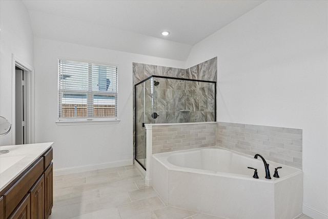 12816 Rocky Top Rd, Godley, TX 76044 - full bathroom with a garden tub, a stall shower, vanity, baseboards, and recessed lighting