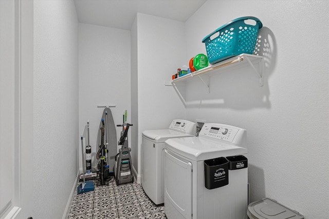 12816 Rocky Top Rd, Godley, TX 76044 - washroom with light floors, washing machine and dryer, baseboards, and laundry area