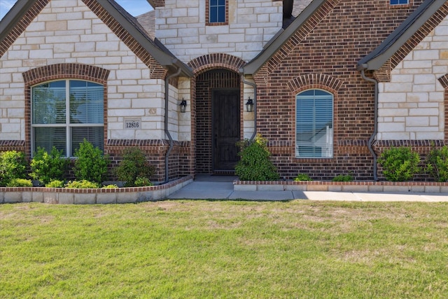 12816 Rocky Top Rd, Godley, TX 76044 - entrance to property with brick siding, a yard, and stone siding
