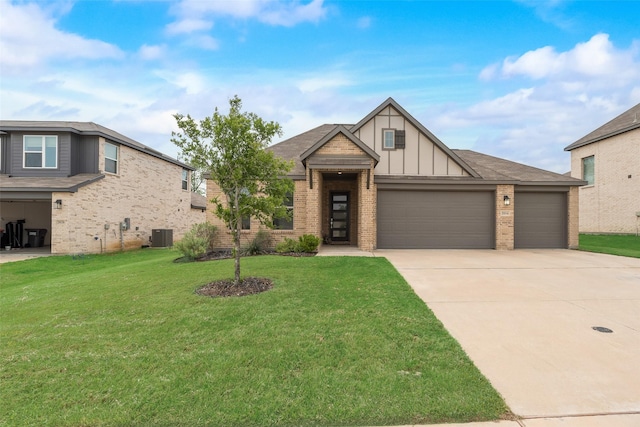 view of front facade featuring a front lawn, an attached garage, board and batten siding, driveway, and brick siding