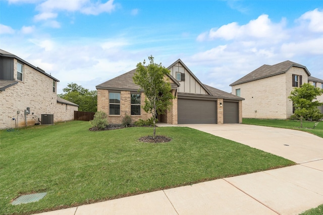 tudor house featuring an attached garage, brick siding, board and batten siding, and driveway
