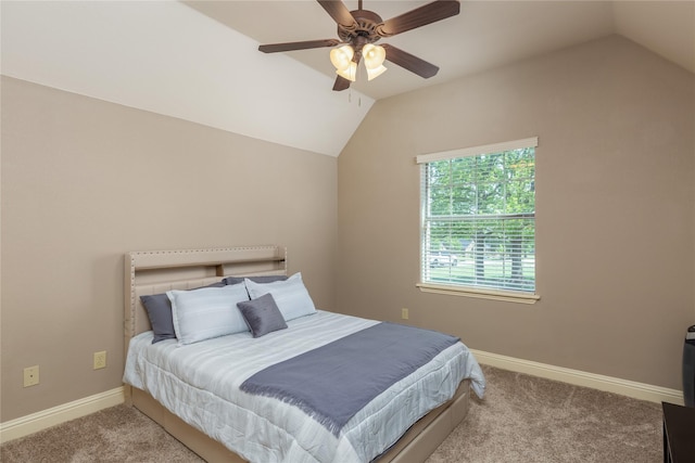 living room with baseboards, a stone fireplace, visible vents, and ceiling fan