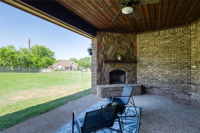100 Meadow Arbor Dr, Weatherford, TX 76085 - view of patio featuring an outdoor stone fireplace and ceiling fan