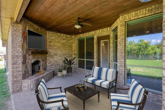 100 Meadow Arbor Dr, Weatherford, TX 76085 - view of patio / terrace featuring a ceiling fan and an outdoor living space with a fireplace