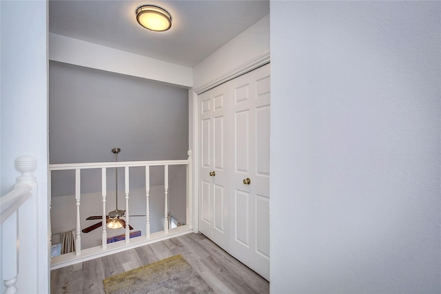 interior space featuring wood finished floors and a ceiling fan