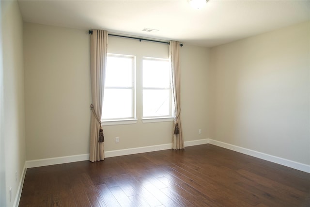 1325 Heavenly Pl, Saint Paul, TX 75098 - spare room with dark wood finished floors, baseboards, and visible vents