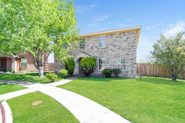 850 Smokey Oak St, Lancaster, TX 75146 - view of front of home featuring brick siding, fence, and a front yard