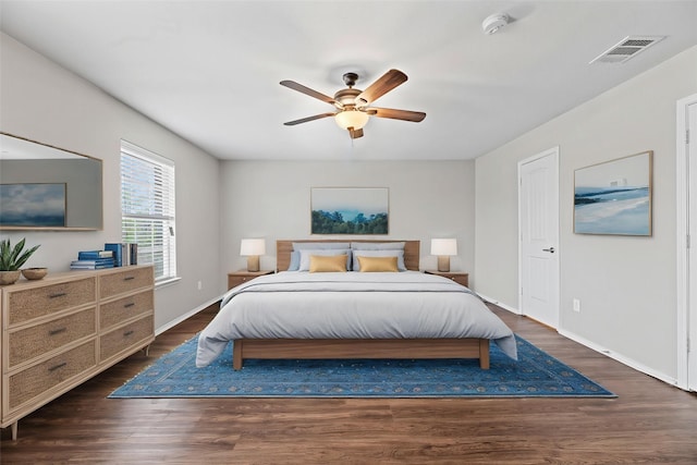 850 Smokey Oak St, Lancaster, TX 75146 - bedroom with baseboards, a ceiling fan, wood finished floors, and visible vents