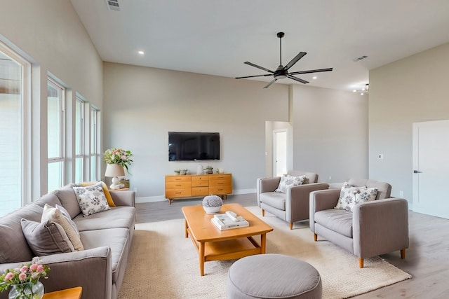 living room featuring recessed lighting, light wood-style floors, visible vents, and ceiling fan
