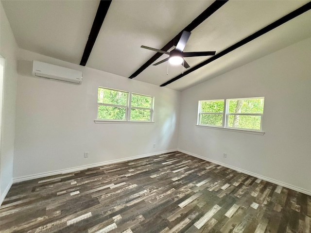 369 County Road 2119, Quitman, TX 75783 - spare room with vaulted ceiling with beams, baseboards, a wall mounted air conditioner, a ceiling fan, and wood finished floors