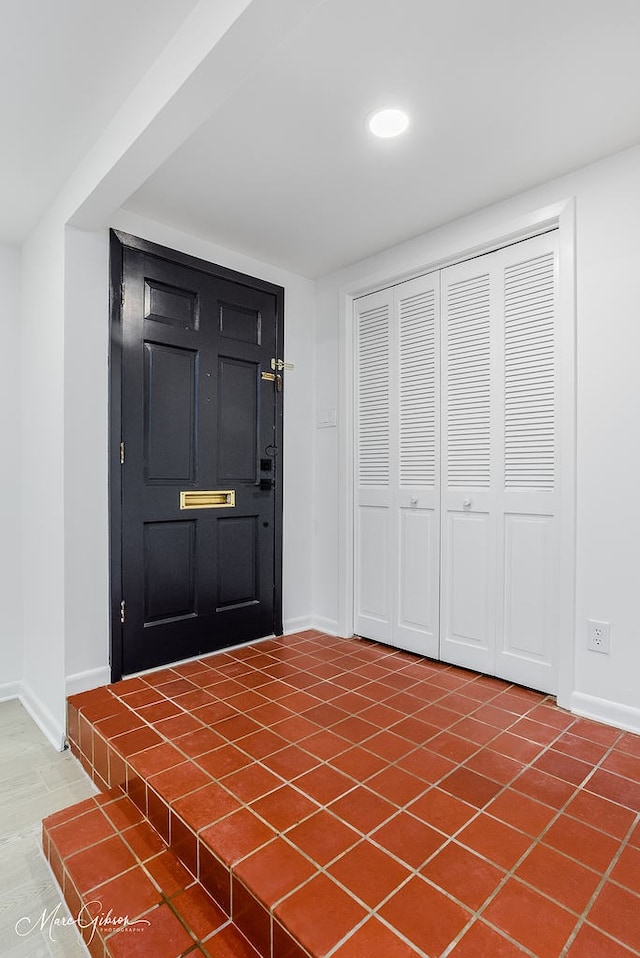 entrance foyer featuring baseboards