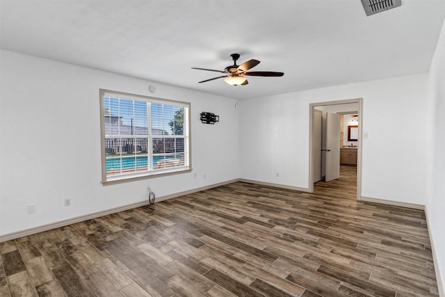 13122 Lipan Hwy, Lipan, TX 76462 - empty room with wood finished floors, visible vents, baseboards, and ceiling fan