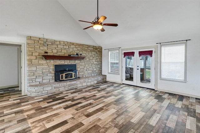 13122 Lipan Hwy, Lipan, TX 76462 - unfurnished living room with french doors, wood finished floors, a wealth of natural light, and ceiling fan