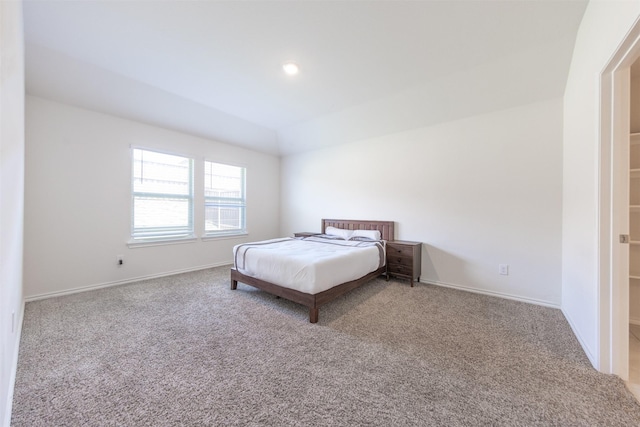 bedroom with baseboards and carpet flooring