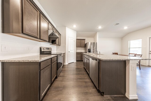 kitchen with dark wood finished floors, dark brown cabinetry, appliances with stainless steel finishes, and visible vents