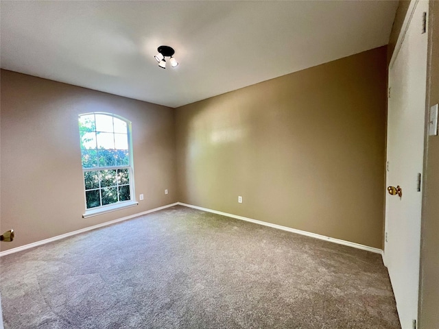 525 Reagan Ln, Burleson, TX 76028 - spare room featuring carpet floors and baseboards