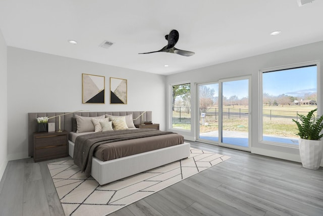 bedroom with ceiling fan, access to outside, visible vents, and recessed lighting