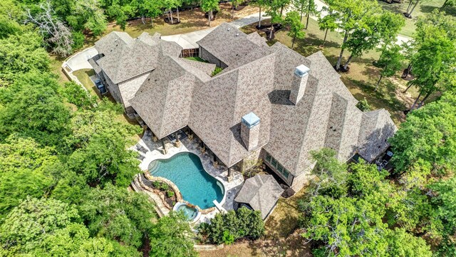 521 W Waters Edge Way, Oak Point, TX 75068 - view of front of house with brick siding, fence, stone siding, and a front yard