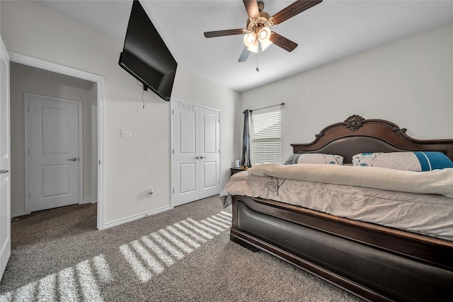 carpeted bedroom with a ceiling fan, baseboards, and a closet
