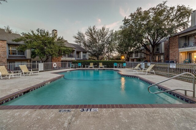 2535 Wedglea Dr Unit 114, Dallas, TX 75211 - community pool featuring fence and a patio area