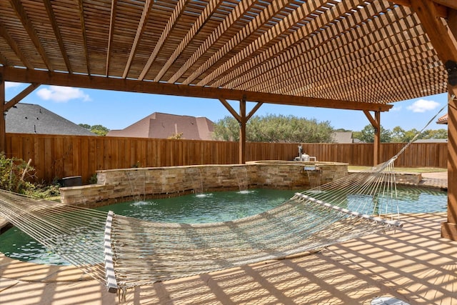 view of pool with a fenced backyard, a fenced in pool, and area for grilling