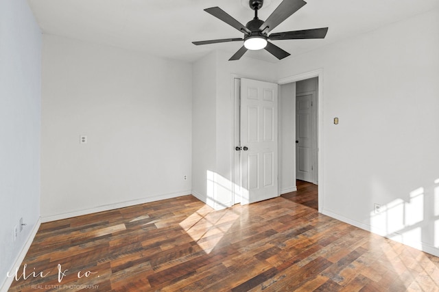 unfurnished bedroom with baseboards, a ceiling fan, and wood finished floors