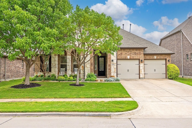 7512 Sabine Dr, Mckinney, TX 75071 - view of front facade featuring a garage, a shingled roof, concrete driveway, a front lawn, and brick siding