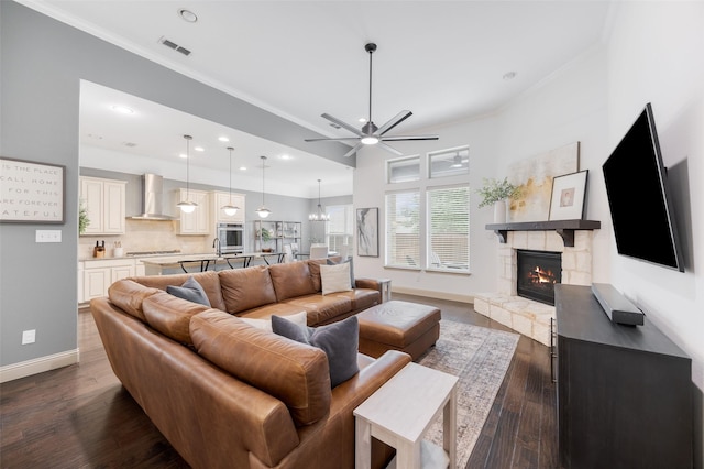 7512 Sabine Dr, Mckinney, TX 75071 - living area featuring a ceiling fan, a stone fireplace, baseboards, recessed lighting, and dark wood finished floors