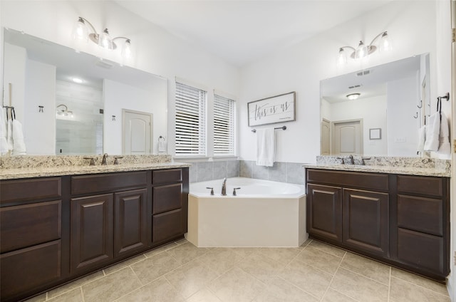 7512 Sabine Dr, Mckinney, TX 75071 - full bathroom featuring a shower stall, a bath, tile patterned floors, and two vanities