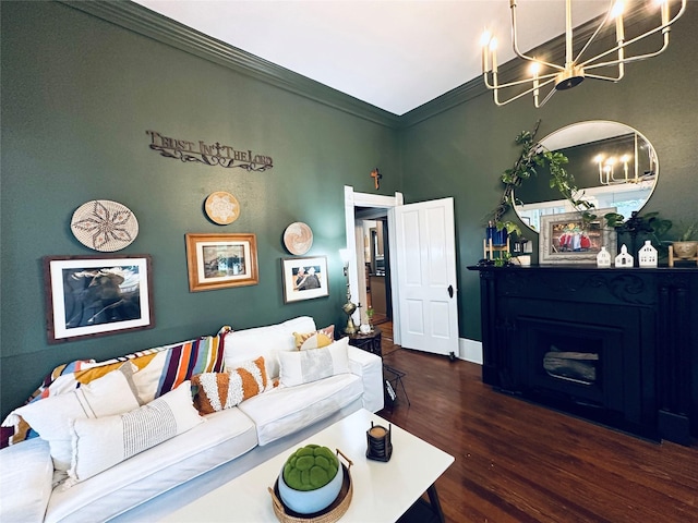 501 N Austin St, Comanche, TX 76442 - living area featuring a chandelier, wood finished floors, a fireplace, and crown molding