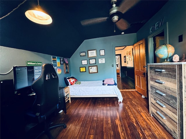 501 N Austin St, Comanche, TX 76442 - bedroom with wood finished floors and vaulted ceiling