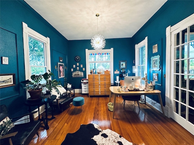 501 N Austin St, Comanche, TX 76442 - office space with wood finished floors, ornamental molding, a chandelier, and baseboards