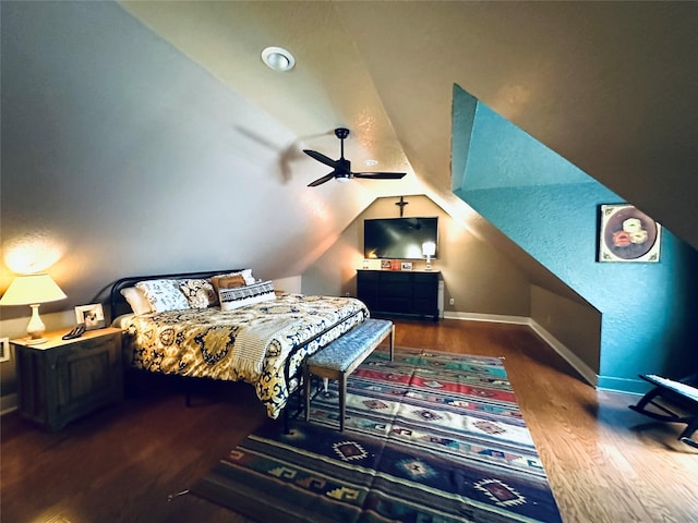 501 N Austin St, Comanche, TX 76442 - bedroom featuring wood finished floors, baseboards, and vaulted ceiling