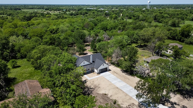 drone / aerial view with a forest view