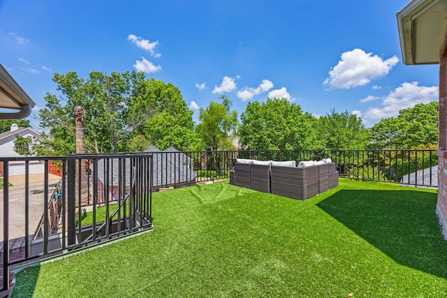 view of yard featuring outdoor lounge area and a fenced backyard