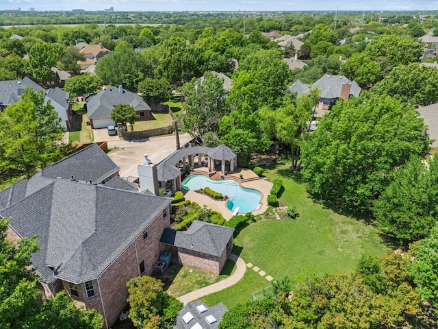 birds eye view of property with a residential view