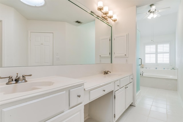 bathroom featuring a ceiling fan, a bath, vanity, tile patterned flooring, and visible vents
