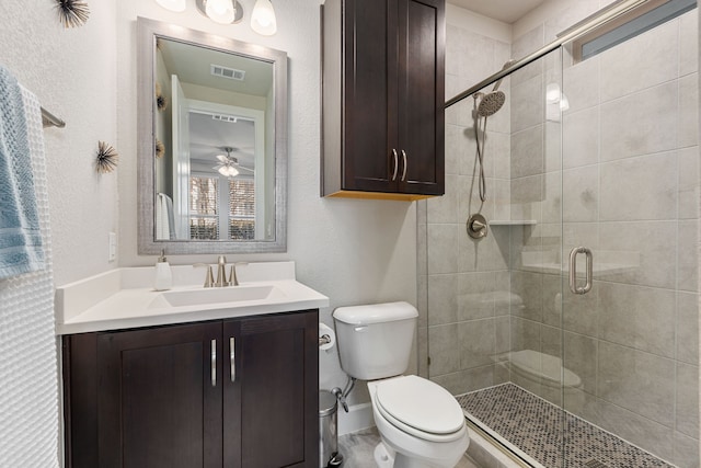 1023 Tea Olive Ln, Dallas, TX 75212 - bathroom featuring a shower stall, vanity, a textured wall, and ceiling fan
