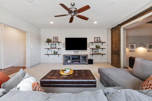 801 Giverny Ln, Southlake, TX 76092 - carpeted living room featuring a barn door, recessed lighting, a ceiling fan, and baseboards