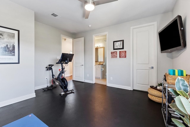 workout room featuring a ceiling fan, visible vents, and baseboards