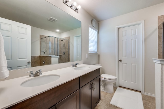 full bath with toilet, a sink, visible vents, and a stall shower