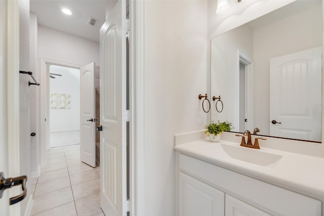 bathroom with visible vents, tile patterned floors, and vanity