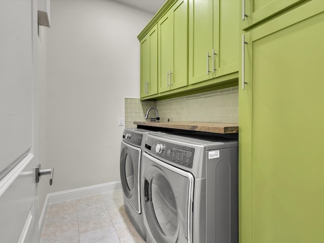 4600 Crossvine Dr, Prosper, TX 75078 - clothes washing area featuring cabinet space, washer and clothes dryer, baseboards, and light tile patterned floors