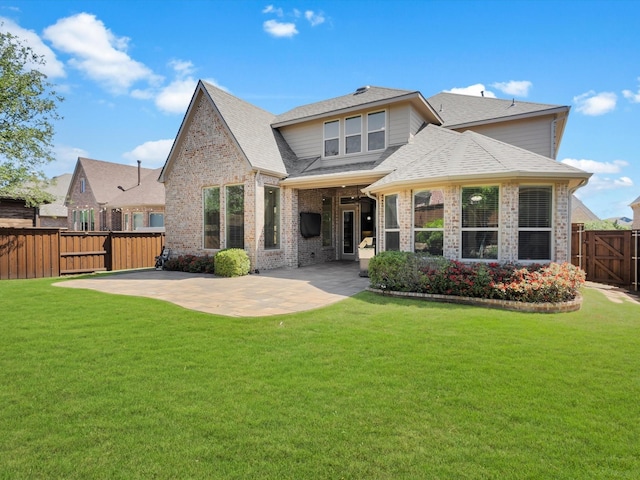 4600 Crossvine Dr, Prosper, TX 75078 - back of property with a patio, roof with shingles, and brick siding