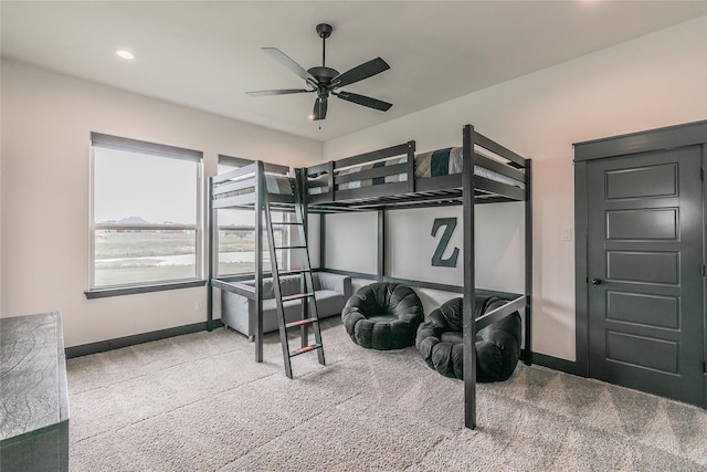 bedroom with baseboards, recessed lighting, a ceiling fan, and carpet
