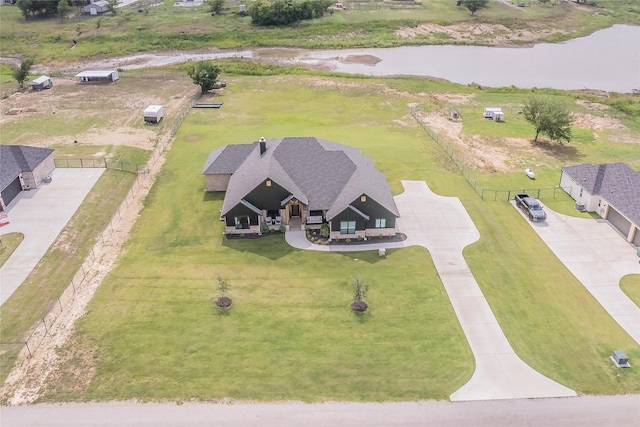 drone / aerial view featuring a water view