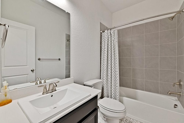 bathroom with a textured wall, vanity, shower / bathtub combination with curtain, and toilet