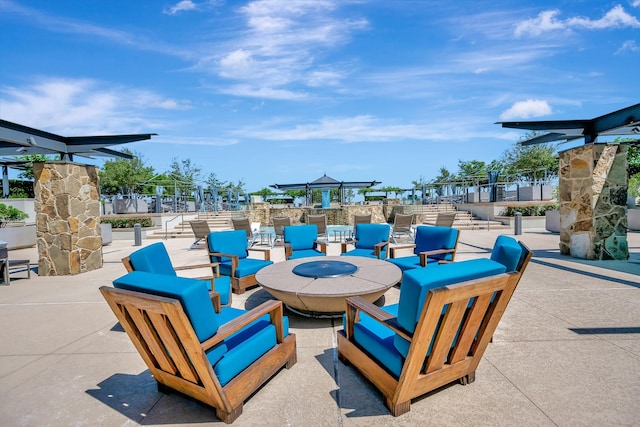 view of patio featuring a fire pit