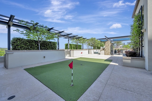 view of home's community featuring a pergola and a patio